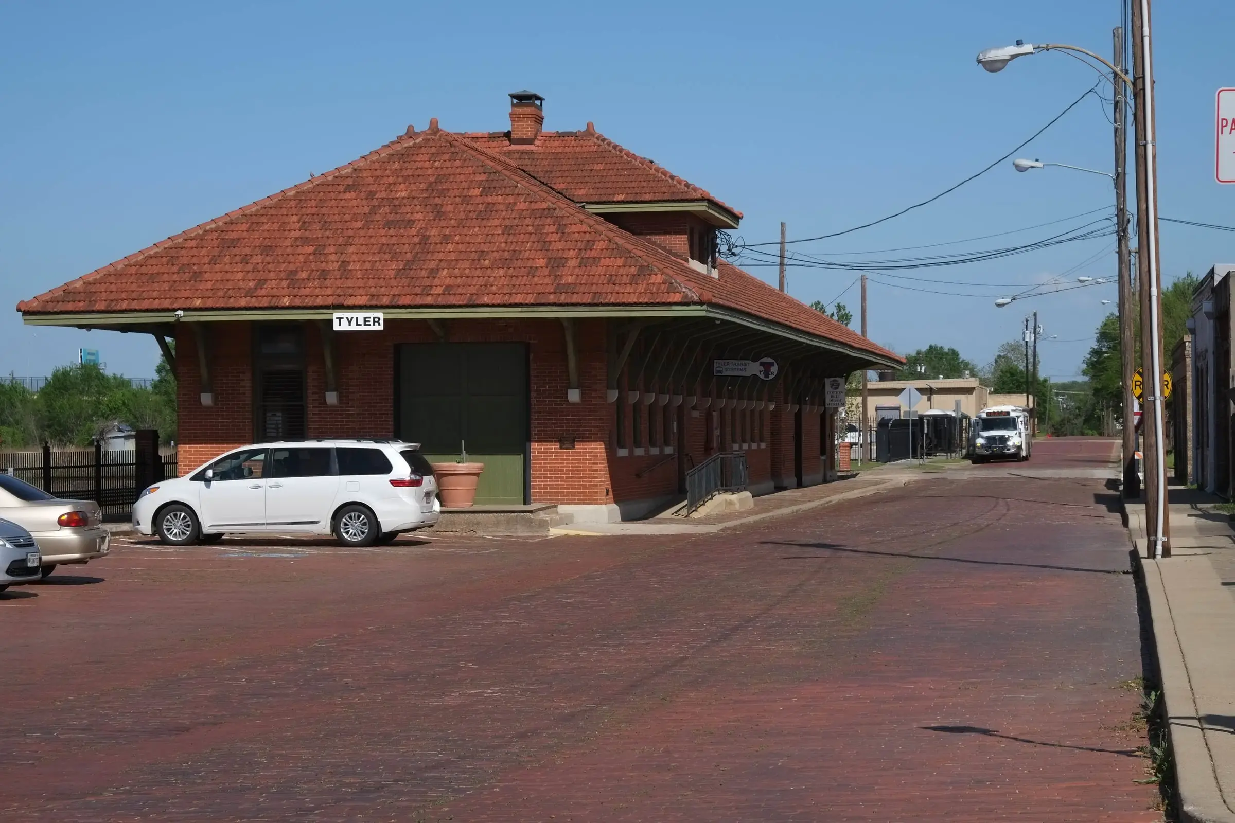 The Cotton Belt depot with a brick-paved street in front